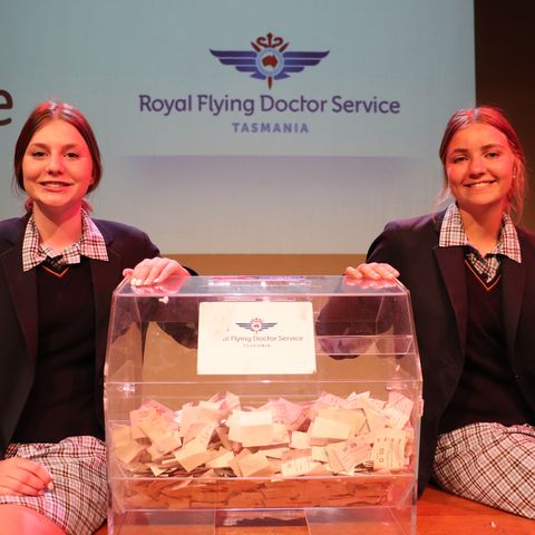 Secondary Schools students in front of their RFDS Tas community raffle project.