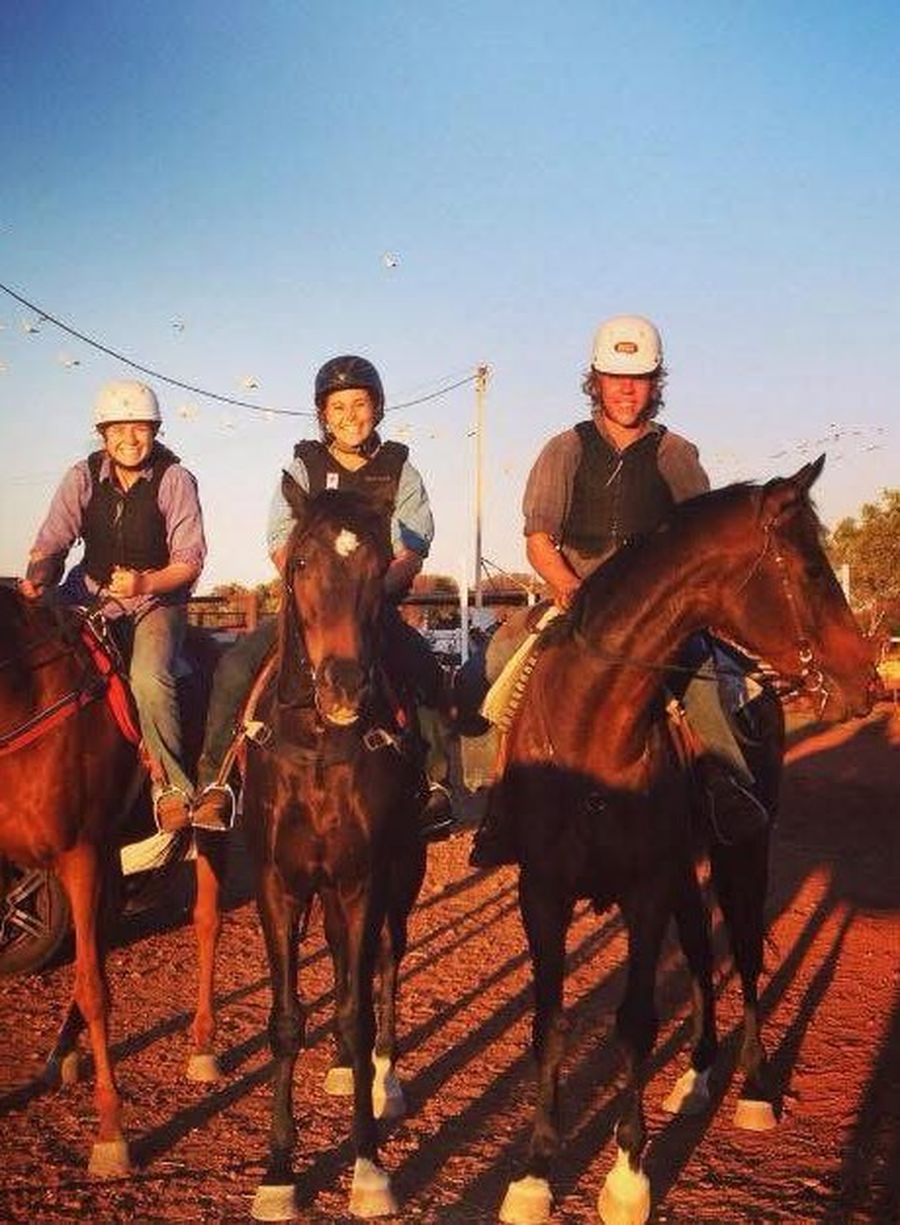 Fergus Gunn on horseback with his fellow station workers