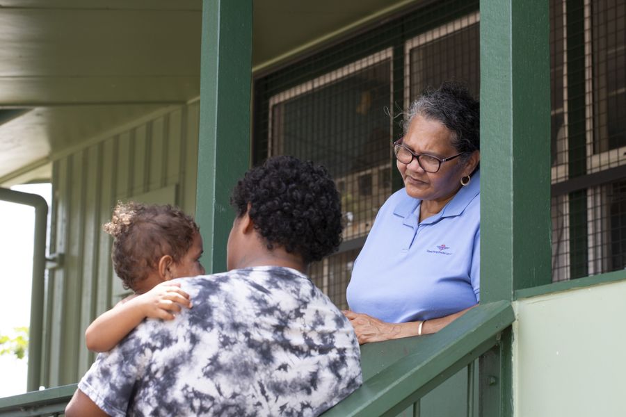RFDS staff talking to parent and child