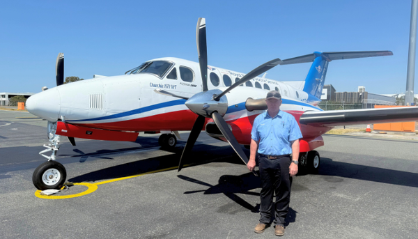 Marty in front of aircraft 
