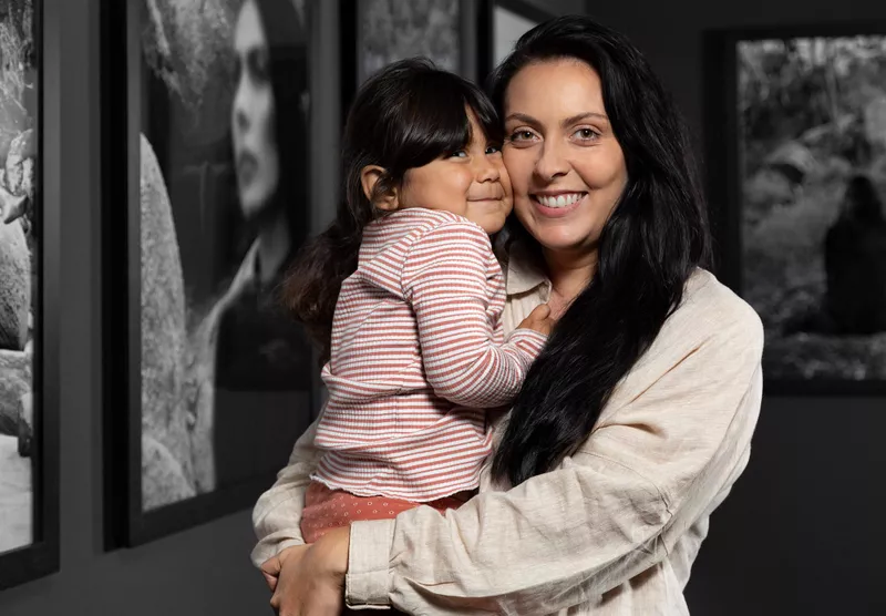 Hayley Millar Baker with her work I Will Survive, Ramsay Art Prize 2021, Art Gallery of South Australia, Adelaide; photo: Saul Steed.