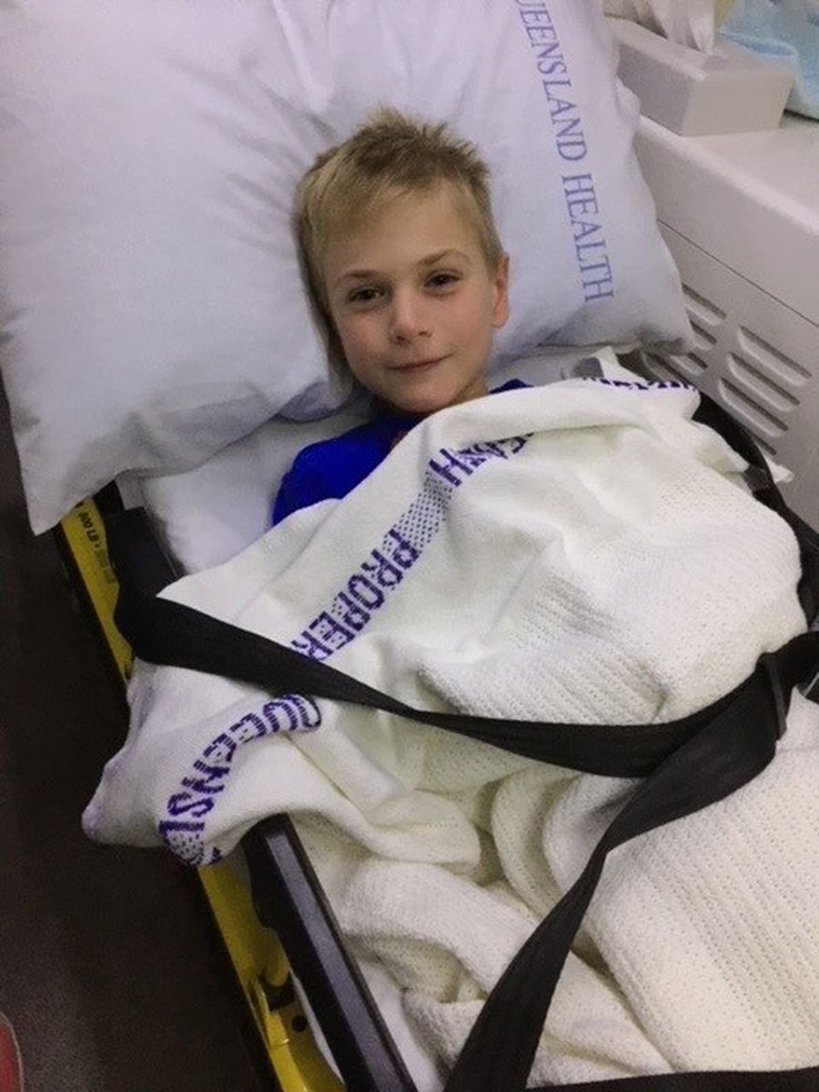 Fred on the RFDS stretcher about to be loaded on the plane