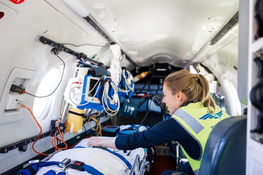 Flight nurse in aircraft