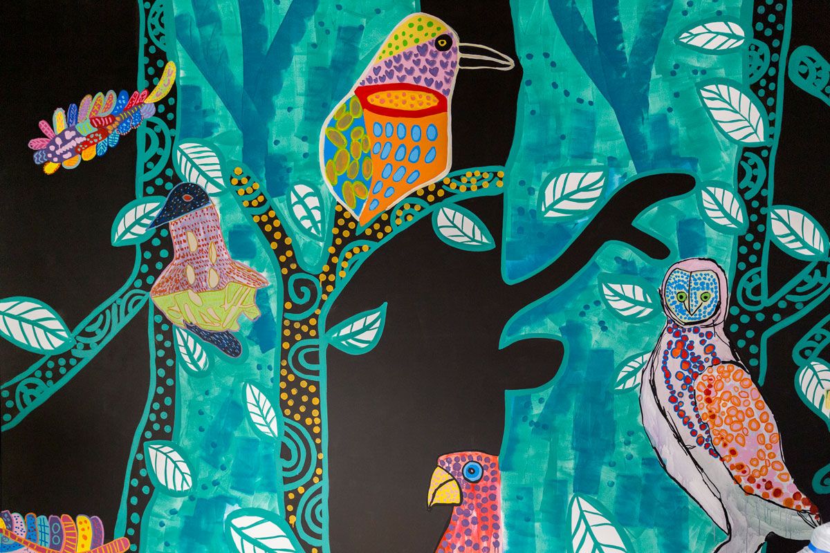 A detail of the wall painting, 'Bird Life Jungle Disco' by Studio A artists
