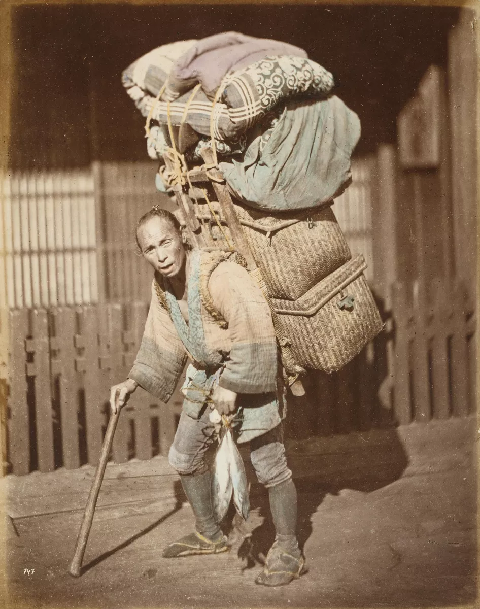Porter with heavy load - AGSA Collection