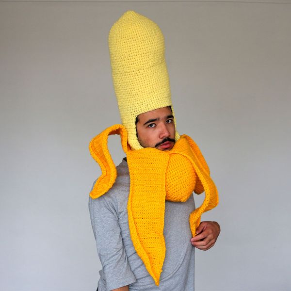 Phil Ferguson aka artist Chili Philly wearing one of his crochet headwear creations, a banana
