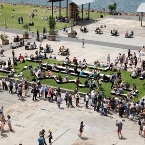 A field with seating benches arranged in shapes to encourage communication