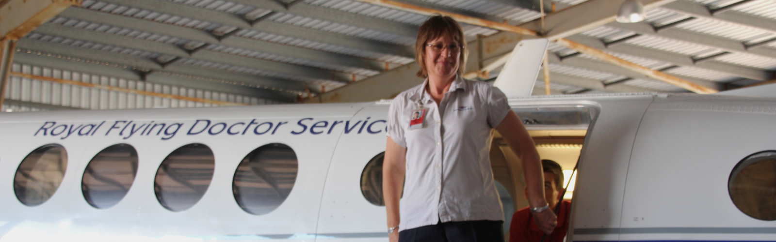 Gail in front of aircraft