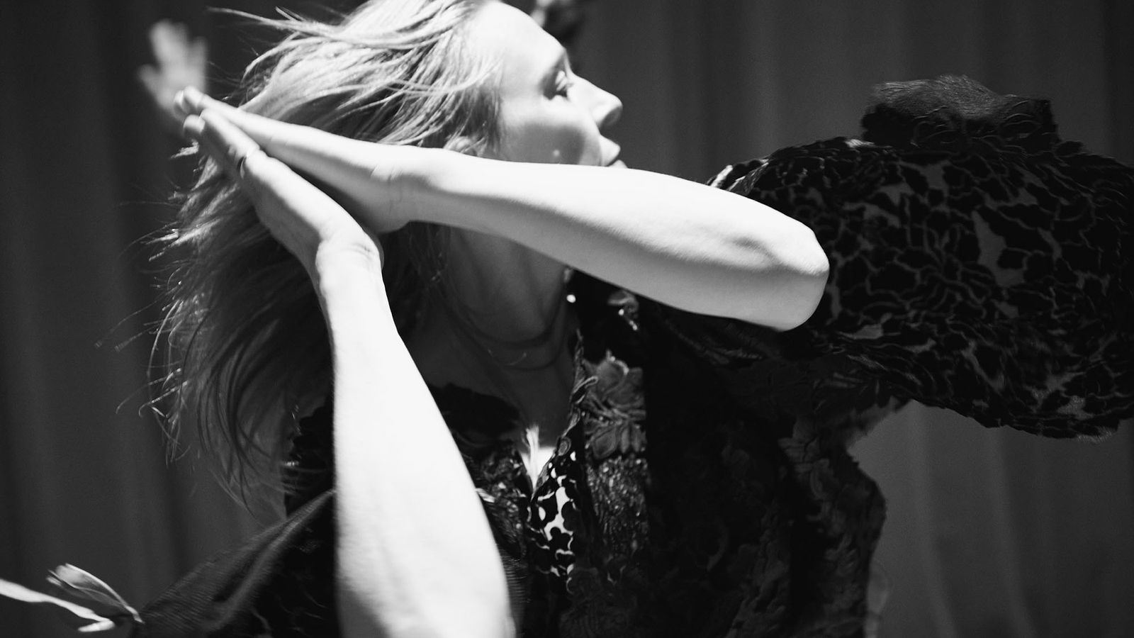 Black and white photograph of Jo Lloyd dancing - movement