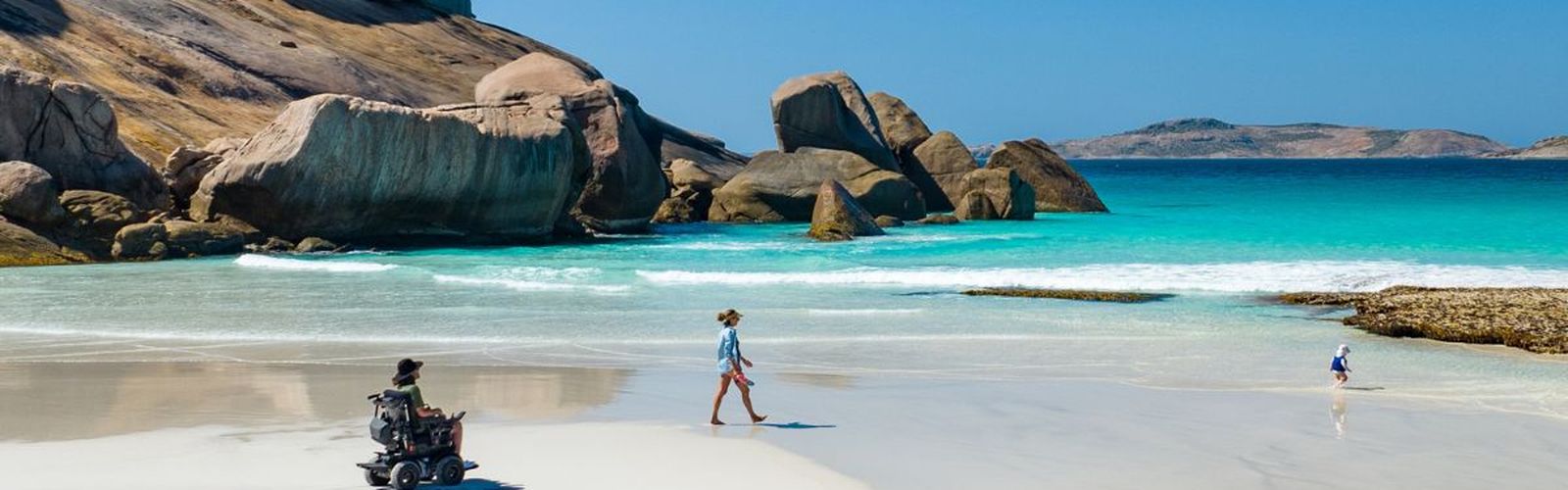 Jaimen and his family on the beach