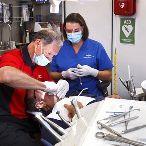 Dentist and patient 