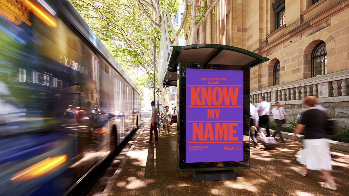 ooh Media branded bus shelter in red and purple