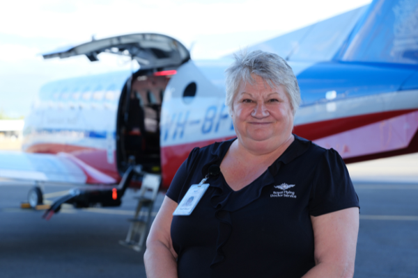 Trish in front of aircraft