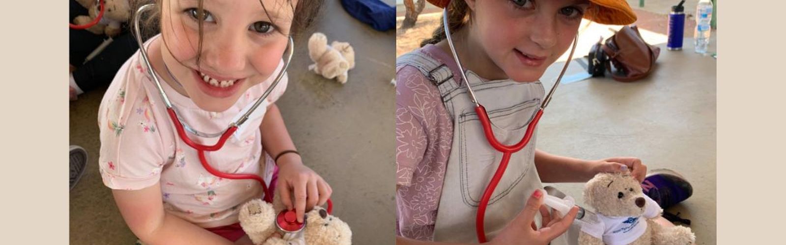 Two children are pictured holding an RFDS teddy bear, learning about wellbeing strategies.