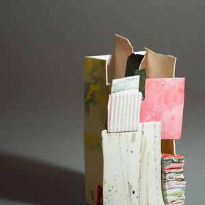 Porcelain slip cast slab built vessel in white with some red