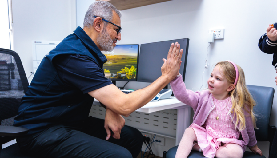Dr Ben with patient