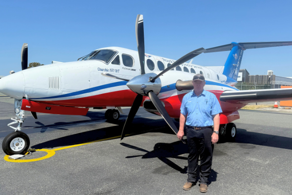 Marty in front of aircraft 