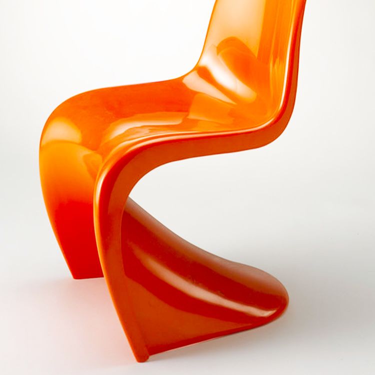 orange plastic chair with white background