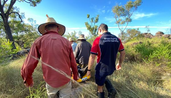 Transferring a patient through rocky terrain