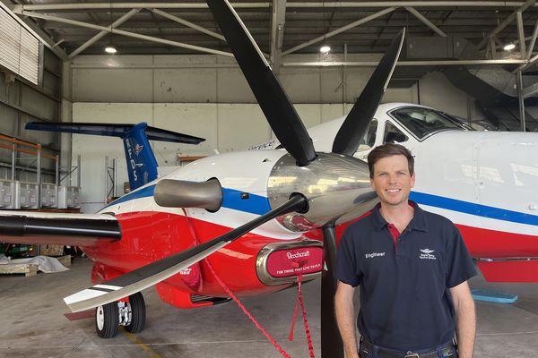 Nick Mann standing in the hangar