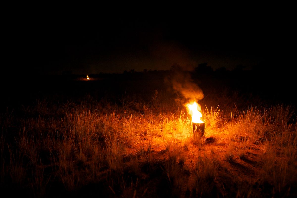 fire lanterns on remote airstrip