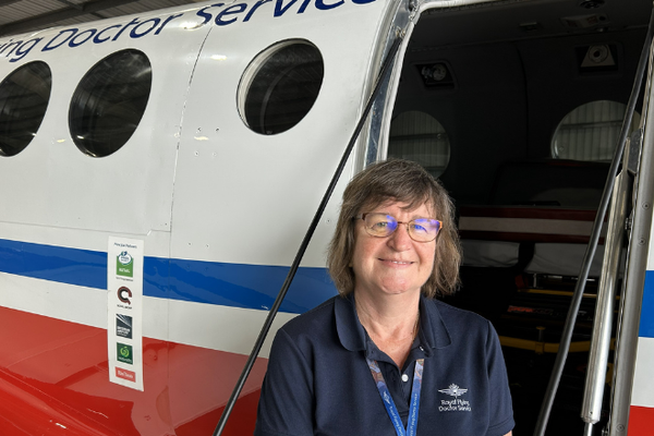 Gail in front of aircraft