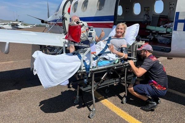 Ella with her baby on the RFDS Flight 