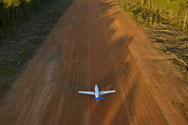 PC-12 on a dirt airstrip