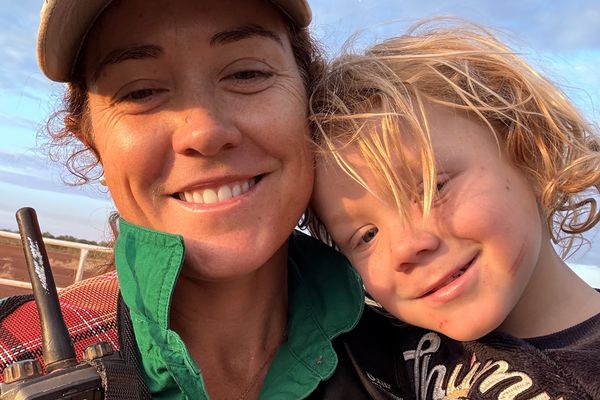 Camille and her young son Lachlan on an outback muster
