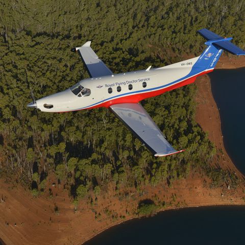Red Belly Planes lined up outside hanger