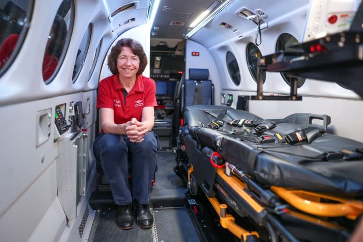 Maree in front of the aircraft