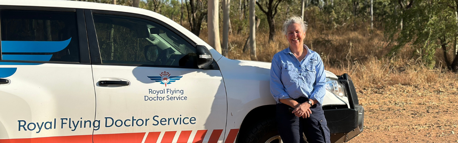 Timna in front of RFDS car