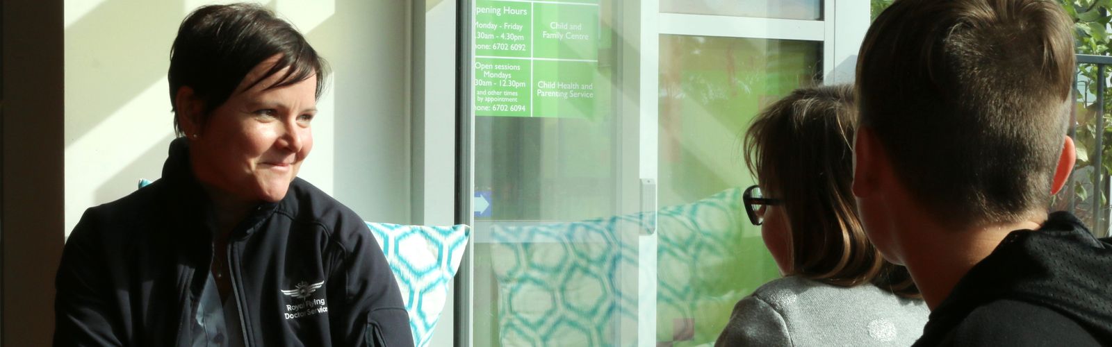 A RFDS TAS mental health clinician talks with children