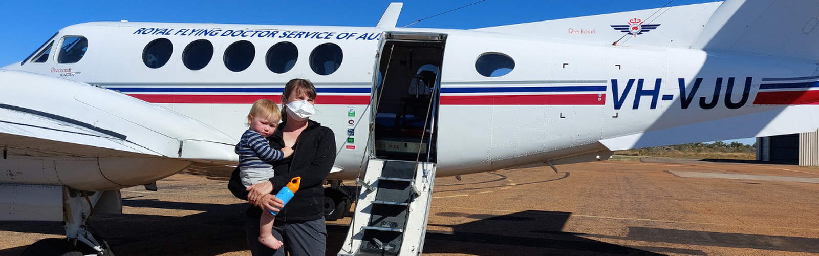 Michelle and son with aircraft 