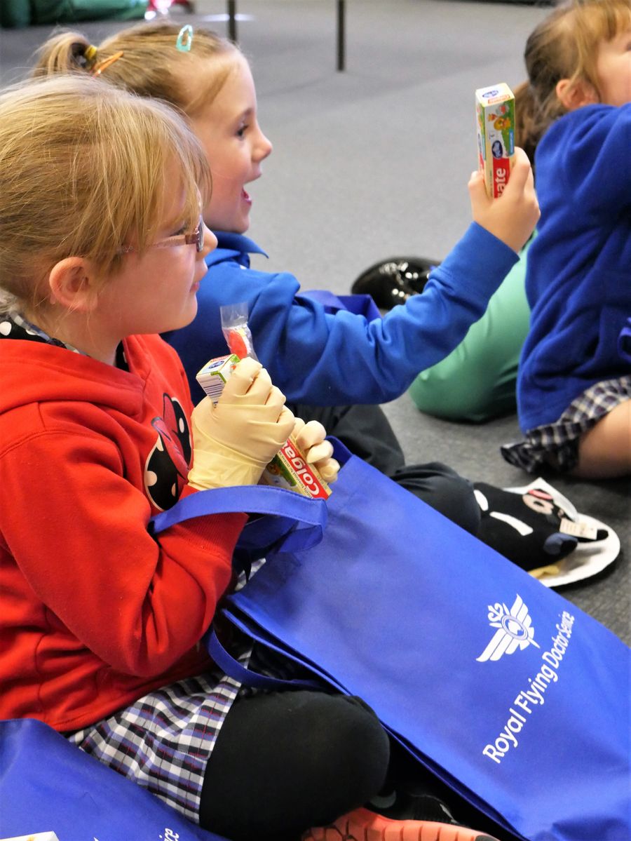School students with dental products
