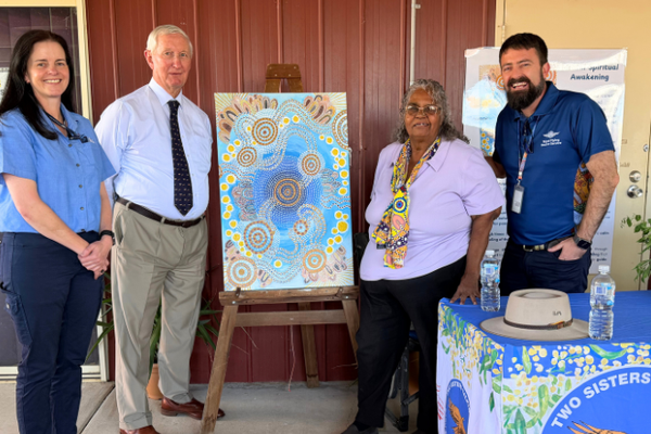 Aunty Joyce Crombie donating artwork to the RFDS