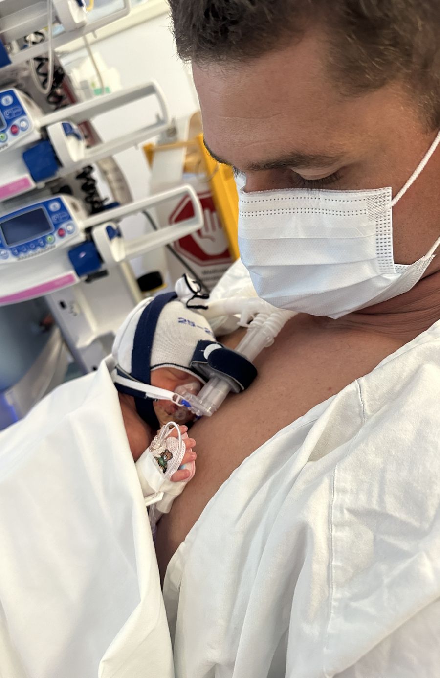 Baby Indi and her parents Joelene and Jake pictured safe in Sydney