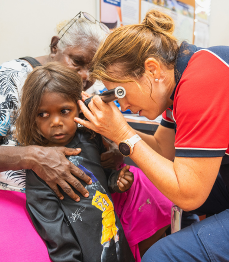 RFDS WA Primary Health Nurse Lisa checking a patient's ear