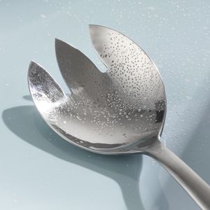 Detail of a serving spoon with engraving