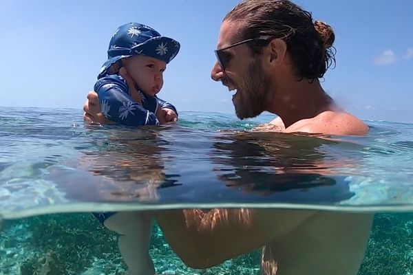 Heinrich and baby Lucas swimming at One Tree