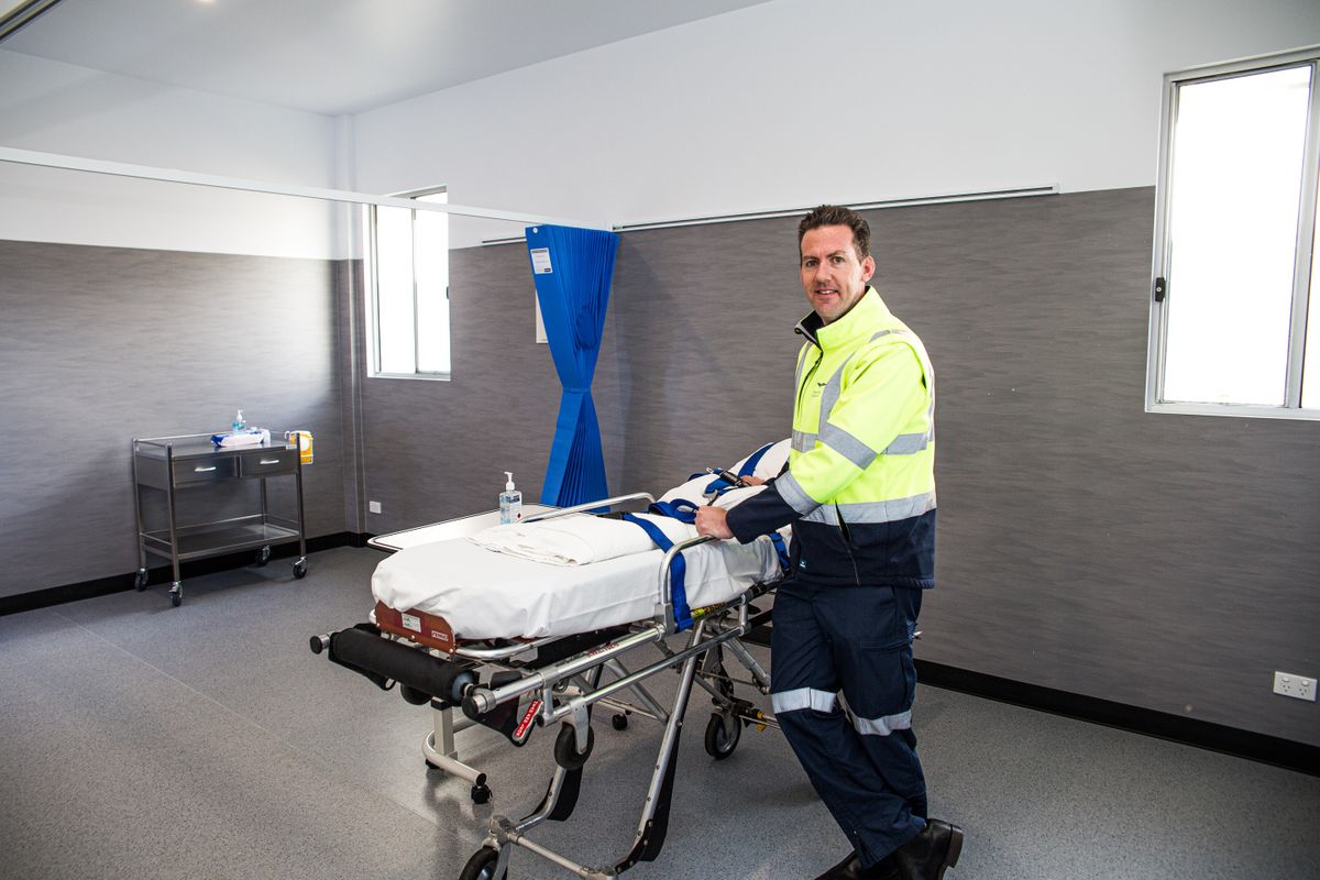 RFDS Flight Nurse with stretcher