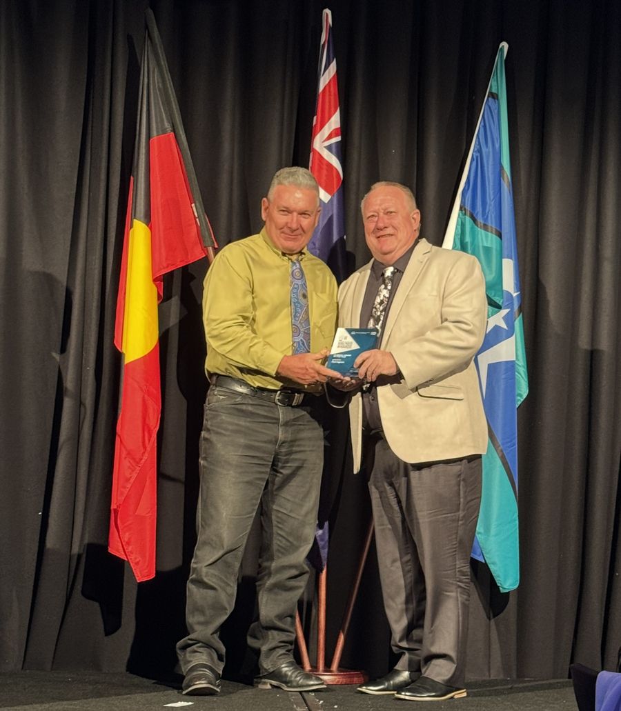 Paul accepting the award on stage