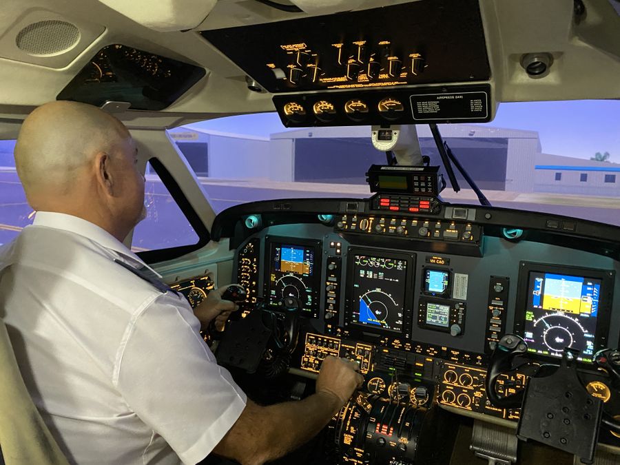RFDS (Queensland Section) Pilot Mick Porfiri in the flight simulator