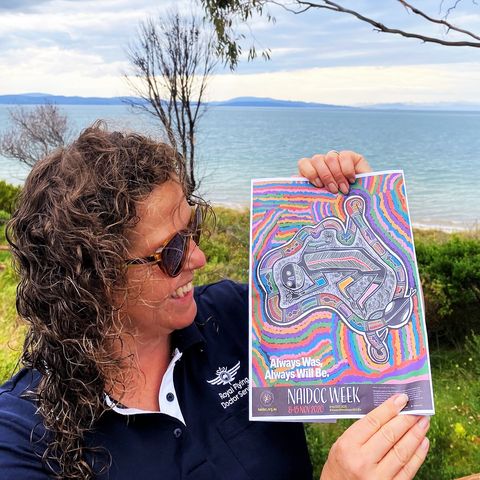 RFDS Staff Holds NAIDOC Poster