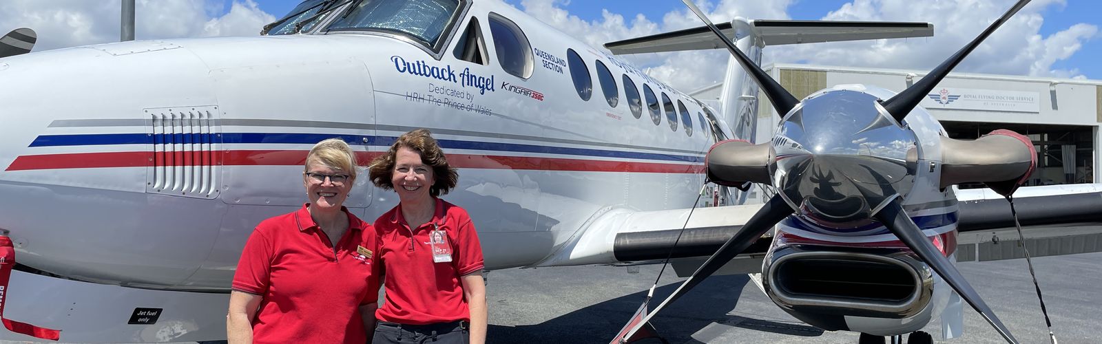 Susan Markwell and Maree Cummins with an RFDS aircraft