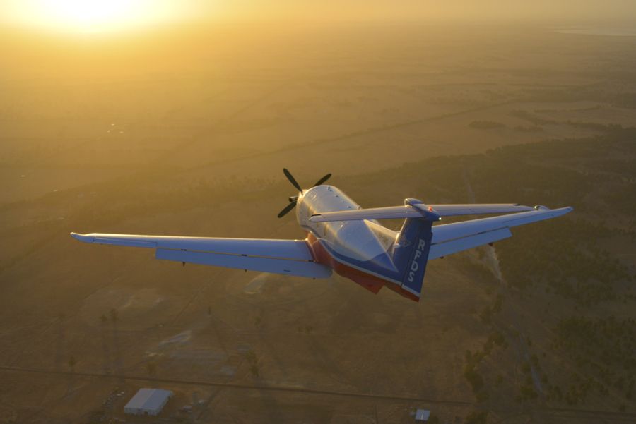 Aircraft flying into sunset