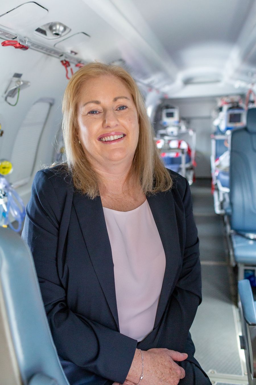Judith Barker CEO of RFDS WA in plane