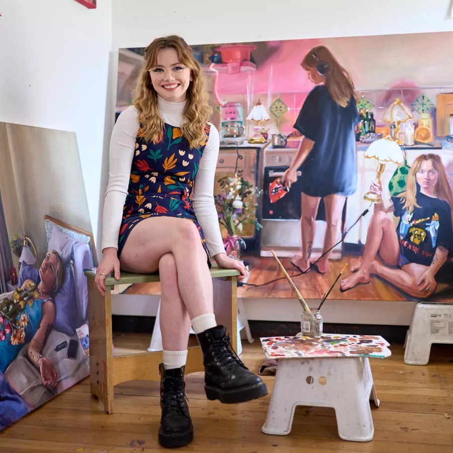 Artist, Kate Hendry sat in her studio.