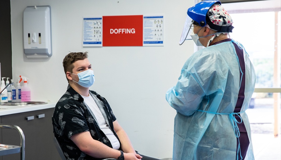 Nurse performing COVID testing