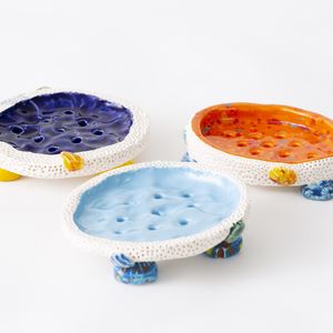 Three colourful ceramic dishes